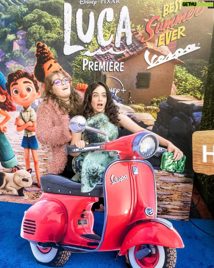 Mary Mouser Instagram - This night was the BEST. Luca is a new fave Disney movie of mine because: 1) The film was adorable and I connected in so many ways and also I cried (of course, it’s the magic of Pixar). 2) Everything was my favorite color (Blue). 3) They gave me delicious gelato at the end that stained my tongue blue (white chocolate and vanilla oat milk like, come ON!) 💙💚💙 Oh, also, @ashleymousermusic, remember that time we almost crashed a Vespa? 😎 (side note - I’m cracking up that it was caught on camera that I wore my Doc Martens most of the evening bc I am terrible at walking in heels and my Docs are my babies 😅) Stylist: @itsamandalim Dress: @notjustalabel Clutch: @tylerellisofficial Heels: @stuartweitzman