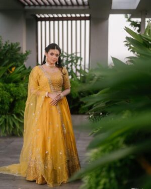 Masuma Rahman Nabila Instagram - @masumanabila In @safiya_sathi 

Whether it is an intimate wedding or a grand one, some brides truly know how to stand out and make a statement with their bold outfit choices. So today, we are embracing all those women who chose or want to choose the beautiful color yellow for their wedding day and simply looked like a million bucks. A new edition to House of Safiya Sathi's wedding couture, a traditional zardousi lehenga, with an exquisite classic cut that looks stunning in the color yellow. There is absolutely no doubt that pastels have been and will always be in fashion. No matter what event you have, or what time the event is, pastel yellow will look stunning if you pick the right shade. This time we opted for a beautiful pastel yellow in motka silk which brings a serene, subtle, and elegant touch to it.

In frame: Masuma Rahman Nabila
Photography: @salmikabir 
Makeup: Nidia Afroz
Jewellery: Dazzle by Sonia

#holudattire