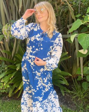 Melissa Rauch Instagram - I took these pics weeks ago when I was out of sweatpants for a change and very naturally gazing off into nothingness, which is totally normal. I said at the time: “I’ve been meaning to post more, I’m gonna post them!” So nearly a month later here we are. I’m FANTASTIC at social media!!!! Also, thank you for my new favorite dress @tucker.nyc 💙