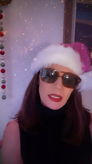Michelle Gomez Instagram - A very #merrychristmas from my North Pole. 

Costume @hair_bycherise 
Killer Blow out @dionysiou 
Lippie @charlottetilbury 
Teeth @dr.nicolas.aguilera 
Root canal @jasondeblinger 
Attitude #needsajusting 
Music: Sugar Plum: Tchaikovsky @nyphilharmonic