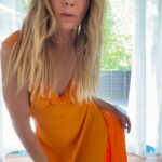 Michelle Monaghan Instagram – The thrill of it all. 🧡 (and for those of you commenting on the new hair – thx to the best of the best @traceycunningham1 and team, I’m loving my new blonde locks! 🤗 and of course donning my favorite new frock by @shopdoen. #happysaturday #lost #mood