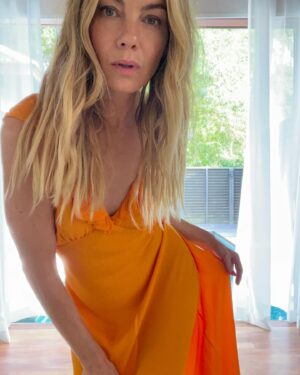 Michelle Monaghan Instagram - The thrill of it all. 🧡 (and for those of you commenting on the new hair - thx to the best of the best @traceycunningham1 and team, I’m loving my new blonde locks! 🤗 and of course donning my favorite new frock by @shopdoen. #happysaturday #lost #mood