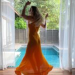 Michelle Monaghan Instagram – The thrill of it all. 🧡 (and for those of you commenting on the new hair – thx to the best of the best @traceycunningham1 and team, I’m loving my new blonde locks! 🤗 and of course donning my favorite new frock by @shopdoen. #happysaturday #lost #mood