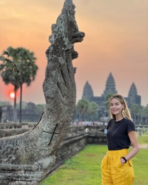 Michelle Monaghan Instagram - Lost in the magic of the ancient temples of Angkor Wat, aka “City of Temples”.✨This Eighth Wonder of the World is the largest religious monument in the world! Built 900 years ago, it holds the mythology of both Hindu and Buddhism religions. To experience its sheer beauty at sunrise was a dream come true. 💫Thank you to my incredible Cambodian tour guide “Lee” @chhvn1y_chhorn for the history lesson and for capturing our awe-inspiring day. I’ll treasure it forever. 🙏 #angkorwat #cambodia
