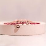 Michelle Wie Instagram - In honor of Mother’s Day this weekend @michellewiewest and @wove_made partnered to create a limited-edition version of the iconic TNT bracelet. The customizable tennis bracelet is now available in PINK SAPPHIRE - the perfect way to add a little color to your wrist stack 💖💞💓💗🌸💘🩷 Treat the ladies in your life to the same bracelet worn by THE Taylor Swift 👑 Shop it at the link in our bio 🔗