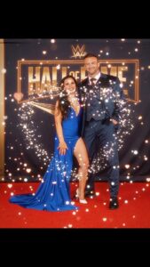 Mickie James Instagram - No place is rather be than by your side. Had to represent the #1 GM for the #1 show in sports entertainment because everything is better in blue. 💙 Congratulations to all the inductees. What an incredible night?! I was honored to be there with so many friends and legends. And big Congratulations to my hubby @nickaldis on your very 1st Wrestlemania . I love to see you finally shine where you have always belonged. I love you! Suit: @nasir_suits Dress: @adolfocanaca Styled by @aristidesfashion #Her Ring @headlinebymm @mckenzienmitchell #wwe #halloffame #wrestlemania #wwehof #redcarpet #redcarpetfashion