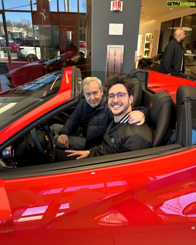 Mikhail Varshavski Instagram - With hard work, childhood dreams can come true 🙏🏼🥲 Feeling beyond blessed to be able to share this moment with my father— Not long ago we were immigrants on welfare behind dealership windows saying “maybe one day” ❤️ I hope @thebearpup likes it 🐻 #ferrari @wideworldferrari @lease_doctor
