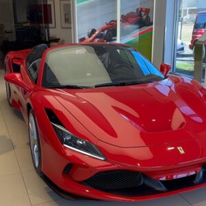 Mikhail Varshavski Instagram - With hard work, childhood dreams can come true 🙏🏼🥲 Feeling beyond blessed to be able to share this moment with my father—  Not long ago we were immigrants on welfare behind dealership windows saying “maybe one day” ❤️ I hope @thebearpup likes it 🐻 #ferrari @wideworldferrari @lease_doctor