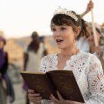 Milana Vayntrub Instagram - Married my husband in front of the temple he built. Our impromptu rabbi @elienblue had us exchange pink sunglasses under a chuppah held by irl spirit guide @michaelawat and lifelong friend @alina.greenbergla and their perfect partners. Thank you to the ladies at @zimmermann for helping me find a dress that was miraculously an extension of the temple. And thank you to @alicyn for the crown! Photos by the trusty, dusty and talented @svetolov. Special shout-out to @ajsalty who we couldn’t and wouldn’t have done it without. Love you. Thank you.