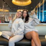 Millie Court Instagram - Besties who travel together and wear matching @whitefoxboutique hoodies 😉✨ let’s gooooo 🇺🇸 Oh and matching dirty old passports 😅 ad Use code MILLIEGRACE or CHLOEB for 30% discount off the website 🫶🏼