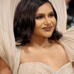 Mindy Kaling Instagram - The name of my gown was “The Melting Flower of Time”. I was so honored to wear the genius @gauravguptaofficial to the Met Gala this year. The cape was inspired by a blooming flower, and his signature sculptural techniques evoked the passage of time. Thank you Gaurav, @voguemagazine and the team of artists who designed my look! 🤍🤍🤍 📸: @gettyentertainment