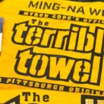 Ming-Na Wen Instagram - Look, mom, I'm on the jumbotron!! What a rush! 🖤💛 #terribletowel #toweltwirl #terribletwirl @themandalorian @thebookofbobafett