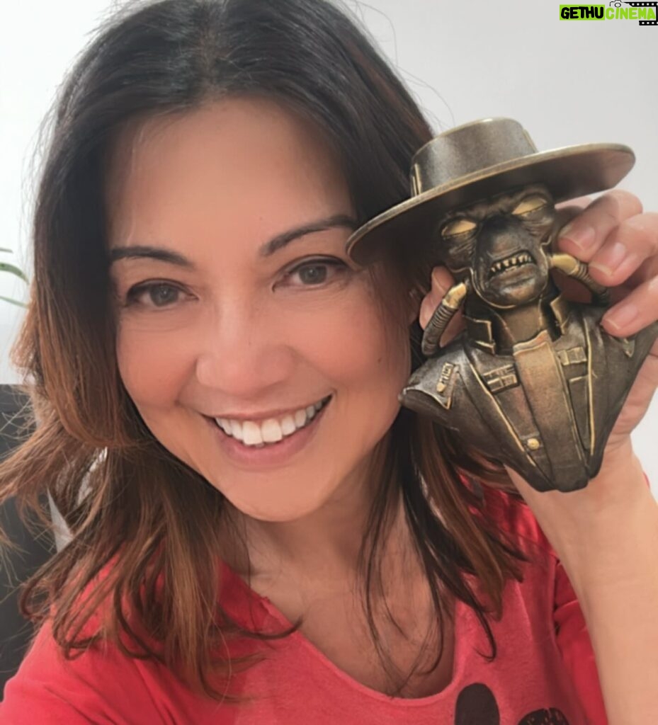 Ming-Na Wen Instagram - I've got Cad Bane in the palm of my hand now!😆 Our very own @themandalorian @hookuptattoos, award winning makeup artist, Alexei Dmitriew, just made me the COOLEST hook to hang my #FennecShand helmet on! Lol Thanks, Alexei!👍🏼🥰 #cadbane #starwars #themandalorian #thebadbatch