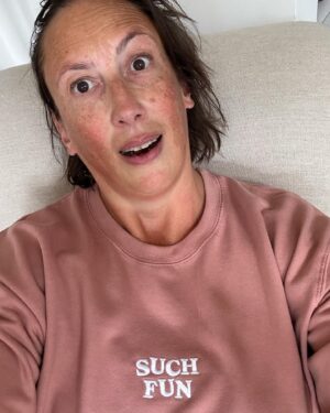 Miranda Hart Instagram - Sweating after a declutter!
I am the biggest dress size I have ever been and I have about 14 items of clothes I fit into. Some trousers, 6 shirts, 2 jumpers, 1 cardi, 1 jacket. And I wonder why I ever felt I needed more.  I am not going to get anything else. I love the simplicity and with all the need in the world feel lucky to have these. 
And I would be lying if I said I didn’t have @themirandashop items in my size to bring some variety and colour like my sweatshirt. 
I will wear my own shop items without embarrassment as I slowly start to wear the unexpected change in my body without embarrassment too.  Not because I feel lesser for being bigger but because any change takes a beat to get used to. But I might as well enjoy it.  If I lose the menopausal mounds again in a few years I might miss them! 🧡