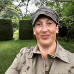 Miranda Hart Instagram - She’s smiling in the rain. She’s talking about herself in the third person. She’s wearing a new jacket that makes her feel like a cross between a gardener, a landgirl and Indiana Jones. Important details of why I share here:- British outerwear brand @TROYLondonUK has teamed up with @CountrysideFund by releasing a selection of their best-selling Tracker Jackets individually embroidered with The Prince’s Countryside Fund logo and donating £50 from each sale to the charity through the summer. These 100% cotton jackets are a great summer layer for those looking to support the vital work of the PCF to support farming businesses, rural enterprises, and provide training opportunities for young people.