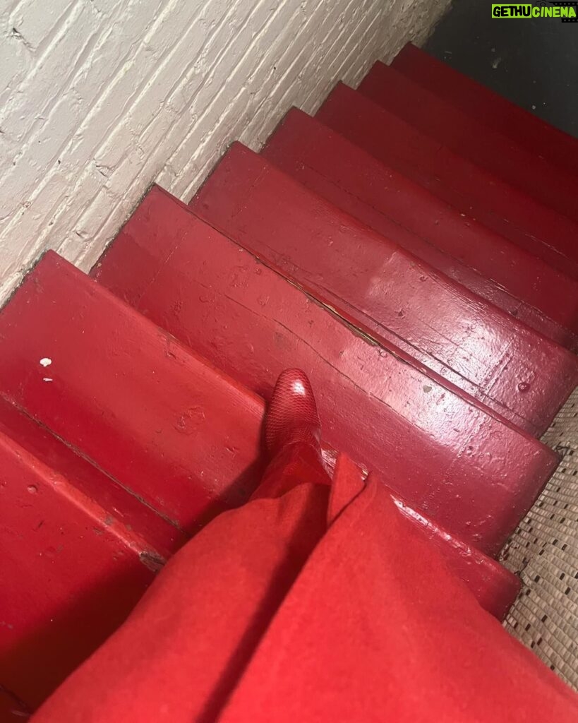 Molly Ringwald Instagram - When you and your new red Rachel Comey boots match the stairwell you have to document. ♥️