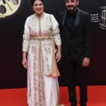 Mounia Lamkimel Instagram - @marrakechfilmfestival @naamanadil 👗: @zor.creations 💪♥️ #redcarpet #festival #cinema #actress #actresshot #couple #light #shining #caftanmoroccan #caftan #mounialamkimel #mounia_lamkimel #سينما #قفطان #قفطان_مغربي #مهرجان #مونية_لمكيمل