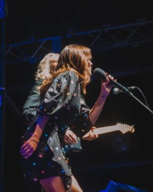 Natalie Imbruglia Instagram - “Oh what a night🎶”… 
Thank you Launceston! Such a warm crowd in Tasmania last night AND I had a much needed  catch up with my sister @lauraimbruglia too! A fun night of Karaoke at The Irish was had by all!! 
First 3 pics by @elfie_germein 💜
The rest by @karenrossiter 

Styling @fredericalovellpank 

@thecorrsofficial TOUR OZ/NZ 💜🎶

@thetonichilds 🦄
@germeinsisters 🦋