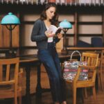 Natalie Portman Instagram - As we close the latest chapter of the #DiorBookTote Club, enjoy a last literary wander with Dior Ambassador @NataliePortman. In her #DiorSS24 bag imagined by @MariaGraziaChiuri, find the inspiring 'Hope in the Dark: Untold Histories, Wild Possibilities', by Rebecca Solnit, and the captivating 'On Photography', by Susan Sontag. © @MarionBerrin