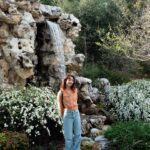 Natasha Liu Bordizzo Instagram - Start of Spring things 🌱 1. Starting an exciting project in the backyard. Clue: it involves a lot of fruit. 2. The babies! 3. The Huntington in March 🤍 4. Replacing grass with a Californian wildflower mix. 5. The same patch, a few days later 🥹 6. 🌸 7. Our DIY rock pool… I’m obsessed. Built via YouTube tutorial! We found a lot of the rocks on the street :’) 8. An artist and his art….