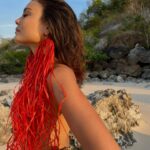 Nathalie Kelley Instagram - Before we decided it was cool to wear plastic clothes that never biodegrade (nylon, polyester etc) - we were adorning ourselves with natural fibers that include grasses and palms like Raffia…. What @madeforawoman have done is nothing short of spectacular - reclaiming raffia as a viable textile - one that is beautiful, noble, humble and luxurious and the same time. Employing young women in Madagascar where the raffia is harvested, processed and then crochet knit into clothing and handbags - designer (and dear friend) @eileen_akbaraly had humanity and our relationship to the Earth in mind when she first came up with this concept. I am so excited to see what she does this next season… the new luxury is being draped in palm leaves, harvested sustainably, knit ethically and then gifted back to earth once you have loved the item until it’s end… ❤️