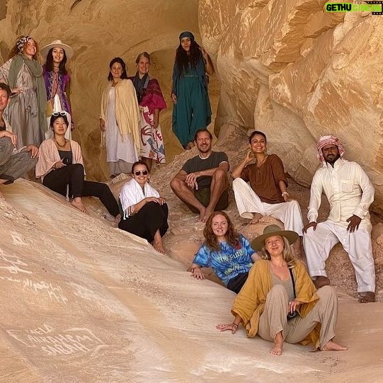 Nathalie Kelley Instagram - An escape into the Sinai desert with our Bedouin brothers to dream of new JUST and JOYFUL futures with these climate justice warriors; amongst us singers, storytellers and policy makers. Earlier that week Youseff, a Bedouin man had told me how grateful he was that we were bringing the climate change conversation to Sinai. He told me that the Bedouins are also very aware that the world is now out of balance… he said even when they go to eat their traditional foods, like goats - they are now finding plastic inside. :( On this particular sunrise we imagined a post plastic and fossil fuel future - a world in which our more-than-human family (the animals, fungi, trees, mountains and waters) were seen as KIN. Thank you @lilycole for facilitating this potent meeting of minds and hearts. (Also loving your recent name change to Lily Solar Power!) And thank you @louisderohan for capturing the magic of these desert moments. #COP27