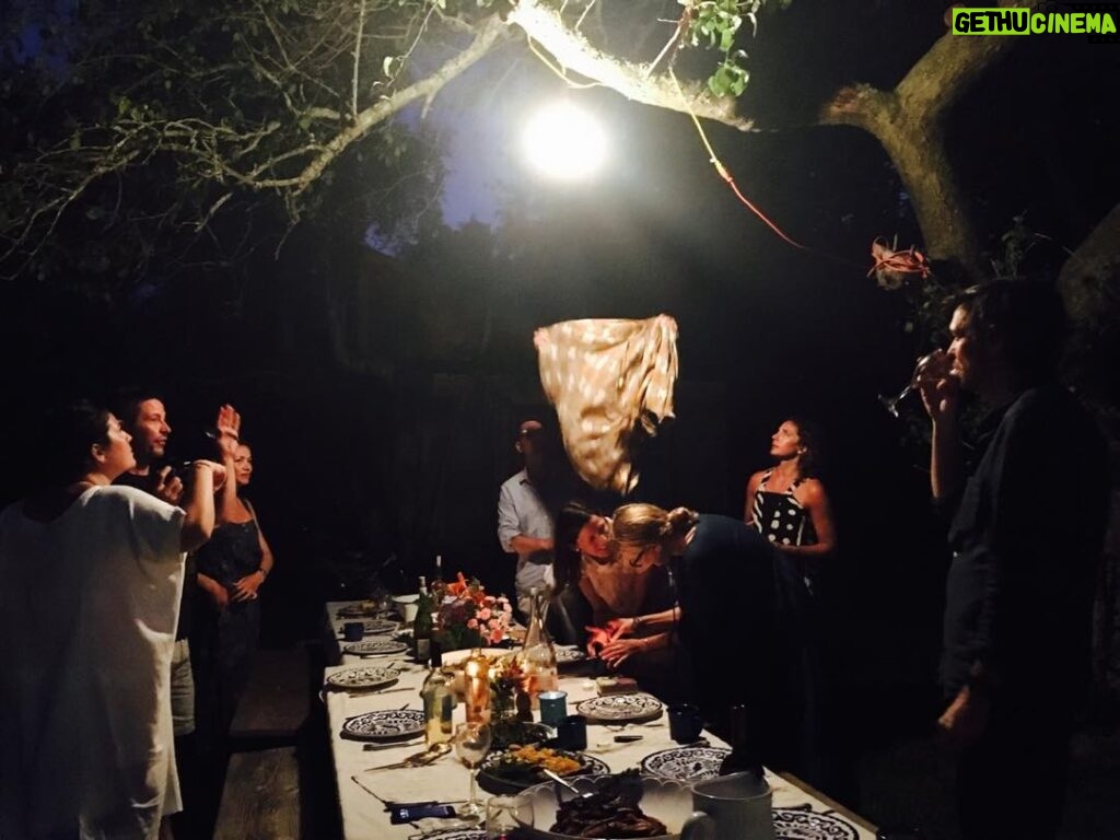 Neve Campbell Instagram - Setting the mood for dinner with friends. Let there be light!