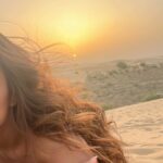 Nia Sharma Instagram - After burning in the scorching sun… you earn a sunset like this🌅 #desert