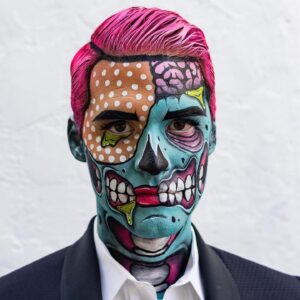 Nicole Faulkner Instagram - Throwback pop art zombie makeup on @raymondbraun 👻

#halloween #halloweencostume #zombiemakeup #facepaint #halloweenmakeup