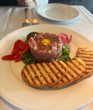 Nina Lu Instagram - one sister has been wanting to try steak tartare for 5 months, 
the other sister owes the first sister a birthday gift,
✨steak tartare for lunch✨