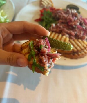 Nina Lu Instagram - one sister has been wanting to try steak tartare for 5 months, 
the other sister owes the first sister a birthday gift,
✨steak tartare for lunch✨