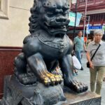 Nina Lu Instagram - My newest obsession is the fact that every traditional Chinese Lion statue pair has a female lion with a baby lion under her paw and a male lion with a ball under his paw!!! (Because women raise the young and men… get to play basketball??? 😀)