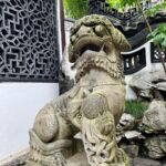Nina Lu Instagram - My newest obsession is the fact that every traditional Chinese Lion statue pair has a female lion with a baby lion under her paw and a male lion with a ball under his paw!!! (Because women raise the young and men… get to play basketball??? 😀)