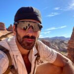 Nyle DiMarco Instagram - Cycling in Moab was a dream realised! The nasty, granddaddy of them all — 62 miles with 5,500 feet elevation gain — named the La Sal Loop is actually a bigger challenge than one of Tour de France stages 😳 Take that, Lance Armstrong! All pure over here! However I must confess that it was a grueling bike ride… in high altitude, from 4,000 base elevation to 9,500, compared to what my heart and lungs are accustomed to… the sea level. No matter how much I prepared for fewer oxygen molecules, the altitude Gods laughed at me pedal after pedal, breath after breath, sneering and whispering in my ear to give up. Oh boy, did I want to quit. Multiple times. I must thank the motorcyclists who cheered on me as they passed and waved in a gesture that told me to keep going, and that stranger who gave me snacks to help push me over the hedge. I did it! In just two days I cycled for a total of 97 miles and 7,000 elevation gain. Over 100 miles if you want to include running. 10/10 would do it again and my future dumbass self shall be more prepared with snacks and water 🙄 anyway thanks for reading and go watch DEAF U on @netflix cuz I’m really proud. Moab, Utah
