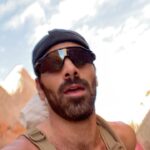 Nyle DiMarco Instagram - Cycling in Moab was a dream realised! The nasty, granddaddy of them all — 62 miles with 5,500 feet elevation gain — named the La Sal Loop is actually a bigger challenge than one of Tour de France stages 😳 Take that, Lance Armstrong! All pure over here! However I must confess that it was a grueling bike ride… in high altitude, from 4,000 base elevation to 9,500, compared to what my heart and lungs are accustomed to… the sea level. No matter how much I prepared for fewer oxygen molecules, the altitude Gods laughed at me pedal after pedal, breath after breath, sneering and whispering in my ear to give up. Oh boy, did I want to quit. Multiple times. I must thank the motorcyclists who cheered on me as they passed and waved in a gesture that told me to keep going, and that stranger who gave me snacks to help push me over the hedge. I did it! In just two days I cycled for a total of 97 miles and 7,000 elevation gain. Over 100 miles if you want to include running. 10/10 would do it again and my future dumbass self shall be more prepared with snacks and water 🙄 anyway thanks for reading and go watch DEAF U on @netflix cuz I’m really proud. Moab, Utah