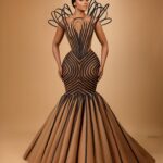 Osas Ighodaro Instagram - ✨ ART at #AMVCA10 ✨ Dress | @veekeejames_official Makeup | @lokengoo Hair | @touchofibee Photography | @officialphotofreak #AMVCA10 #OsasIghodaro #blessed ✨