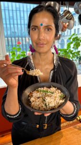 Padma Lakshmi Instagram - This VEGAN Coconut Rice is the perfect answer to leftover rice. It comes together in less than 10 minutes and tastes great warm and at room tempurature, which makes it perfect for a potluck, picnic or after school snack. If you’re not accustomed to having shredded coconut around, look to your Indian or Asian market and grab a bag of UNSWEETENED shredded coconut either frozen or dry (frozen preferred)! It’ll come in handy more than you know. Try it and let me know what you think! I’ll be sure to film some other recipes using shredded coconut too, so you won’t have that bag go to waste!
