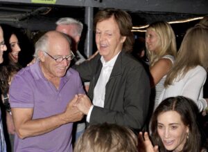 Paul McCartney Instagram - It seems that so many wonderful people are leaving this world, and now Jimmy Buffett is one of them. I’ve known Jimmy for some time and found him to be one of the kindest and most generous people. 

I remember once on holiday when I had forgotten to bring my guitar and was itching to play. He said he would get me one of his, but I said, ‘I’m left-handed’. So, Jimmy had his roadie restring one of his guitars which he loaned me for the duration of the holiday. He then followed this act of generosity by giving me my own beautiful left-handed guitar that had been made by one of his guitar-making pals. It’s a beautiful instrument, and every time I play it now it’ll remind me of what a great man Jimmy was. 

He had a most amazing lust for life and a beautiful sense of humour. When we swapped tales about the past his were so exotic and lush and involved sailing trips and surfing and so many exciting stories that it was hard for me to keep up with him. 

Right up to the last minute his eyes still twinkled with a humour that said, ‘I love this world and I’m going to enjoy every minute of it’. 

So many of us will miss Jimmy and his tremendous personality. His love for us all, and for mankind as a whole. 

Last, but not least, is his songwriting and vocal ability. If someone made an interesting remark he repeated it in his gorgeous Louisiana drawl and said, ‘That’s a good idea for a song’. Most times it didn’t take too long for that song to appear. I was very happy to have played on one of his latest songs called ‘My Gummy Just Kicked In’. We had a real fun session and he played me some of his new songs. One, in particular, I loved was the song, ‘Bubbles Up’. And I told him that not only was the song great but the vocal was probably the best I’ve heard him sing ever. He turned a diving phrase that is used to train people underwater into a metaphor for life when you’re confused and don’t know where you are just follow the bubbles - they’ll take you up to the surface and straighten you out right away. 

So long, Jim. You are a very special man and friend and it was a great privilege to get to know you and love you. Bubbles up, my friend. 

Love, Paul

Photograph by Rob Rich
