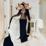 Rachel Brosnahan Instagram - Thank you @voguemagazine for a beautiful night at the Met and thank you to the brilliant @sergiohudson for this 90’s inspired gothic dream of a gown. 🕸️ 🖤🕷️ Shout out and major thanks to the village that makes this glamorous world go round… styling by @mandelkorn, makeup @lisaaharon, hair @owengould, hair color @kittycolorist, nails @geeznails, jewels @simongjewelry, and Charles, Devin, Michael and Geri from Team Sergio. 📷: @theemmaexperience