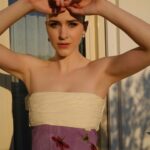 Rachel Brosnahan Instagram - @canneseries in the can(nes)! Thank you @prada @mandelkorn for this painted dream of a dress, @bulgari for the sparkles, @bjornkrischker for the slick ‘do, @lisaaharon for adding hours of sleep to my face and @jessjenn for the pics. Grateful for this village!