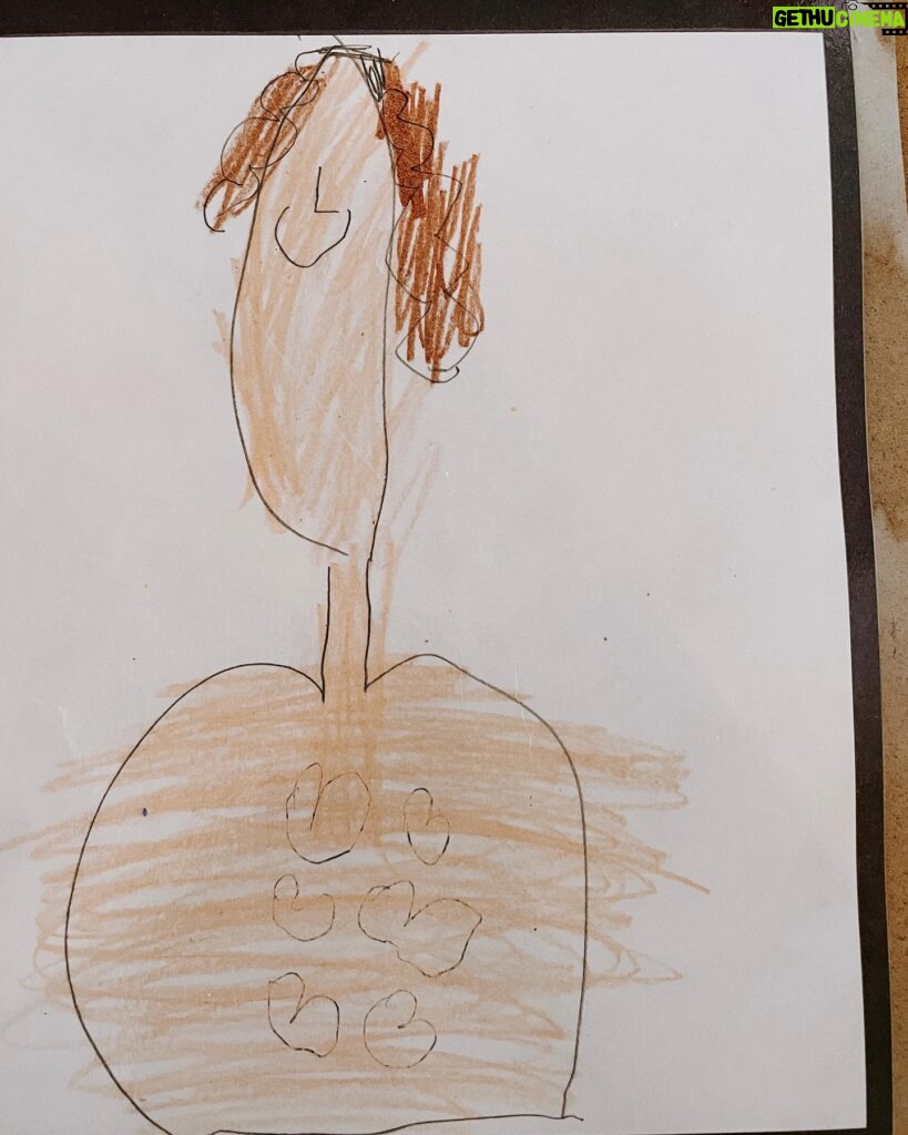 Rachel Hollis Instagram - My 6 year old daughter drew this picture of me. I have 6 hearts? Or a 6-pack? Or 6 boobies? Whatever’s happening on my chest— I don’t have arms or legs but I DO have an a-symmetrical haircut. Yes of COURSE it’s been laminated for safe keeping.
