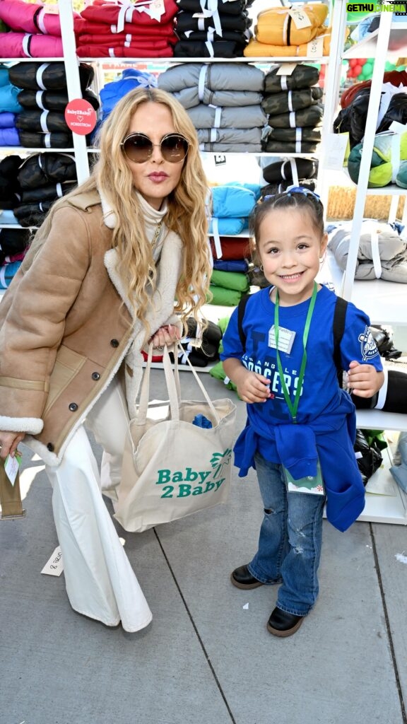 Rachel Zoe Instagram - Truly one of my favorite days of the year is spent with so many of my fellow @baby2baby Angels and supporters at our annual Holiday Party Presented by @FRAME and @nordstrom ✨Together, we work to create a magical day for hundreds of the children we serve by distributing toys, clothing and more essentials at @dodgers stadium. It is such an honor to make holiday wishes come true for so many deserving families. ❤️
