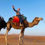Rachel Zoe Instagram - I am proudly sharing this image of my father who will turn #86 years old next month living his best life riding through the desert in Morocco on a camel 🐫 . Keep showing us how it's done and please don't ever do that again 🤦‍♀️ . #Papa #daddysgirl 🙏🏻❤️🐪