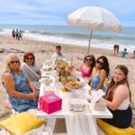 Raini Rodriguez Instagram - It was the most beautiful day in Malibu for a picnic to celebrate love and happiness! There was nothing better than our friends family getting together to play games, eat some yummy charcuterie, & spoil our bride to be. This was my first time ever being a maid of honor and throwing a bridal shower for someone and of course it was all for you, @ashleyargota9 💜 I love ya, Ash & I’m so lucky to call you my best friend. Next stop, the bachelorette party! Thank you @thepicnic.collective for helping to make my bridal shower dreams come true! Every single detail was beautifully done ☀️ I’m already thinking of more picnics I want to have! Also thank you to my amazing mom and @jazzyjill426 for being a helping hand and special thanks to @micktorres & @starringrico for coming towards the end just to carry the bags and presents to our car😂