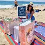 Raini Rodriguez Instagram - It was the most beautiful day in Malibu for a picnic to celebrate love and happiness! There was nothing better than our friends family getting together to play games, eat some yummy charcuterie, & spoil our bride to be. This was my first time ever being a maid of honor and throwing a bridal shower for someone and of course it was all for you, @ashleyargota9 💜 I love ya, Ash & I’m so lucky to call you my best friend. Next stop, the bachelorette party! Thank you @thepicnic.collective for helping to make my bridal shower dreams come true! Every single detail was beautifully done ☀️ I’m already thinking of more picnics I want to have! Also thank you to my amazing mom and @jazzyjill426 for being a helping hand and special thanks to @micktorres & @starringrico for coming towards the end just to carry the bags and presents to our car😂