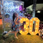 Raini Rodriguez Instagram - Celebrated my 30th bday all month long🎉 The 2nd to last picture represents how much sleep I need for the month of August 😭 Thank you to all of the vendors that helped make my birthday month extra special! Cali- Balloons/backdrop/marquee letters: @charmed.creations.by.gracie Photobooth: @amzphotobooth Hibachi dinner: @chefoscarhibachistyle Dessert: @thechurromantruck Bryan, Tx- Venue/Dinner: @thestellahotel Balloons: @whatspoppinbcs Marquee letters: @alphalitbcs Cake: @peaceloveandcakesbysteffany Flowers: @nitasflowersbryan Music: @djwreck._ Dessert: @threesweetpops