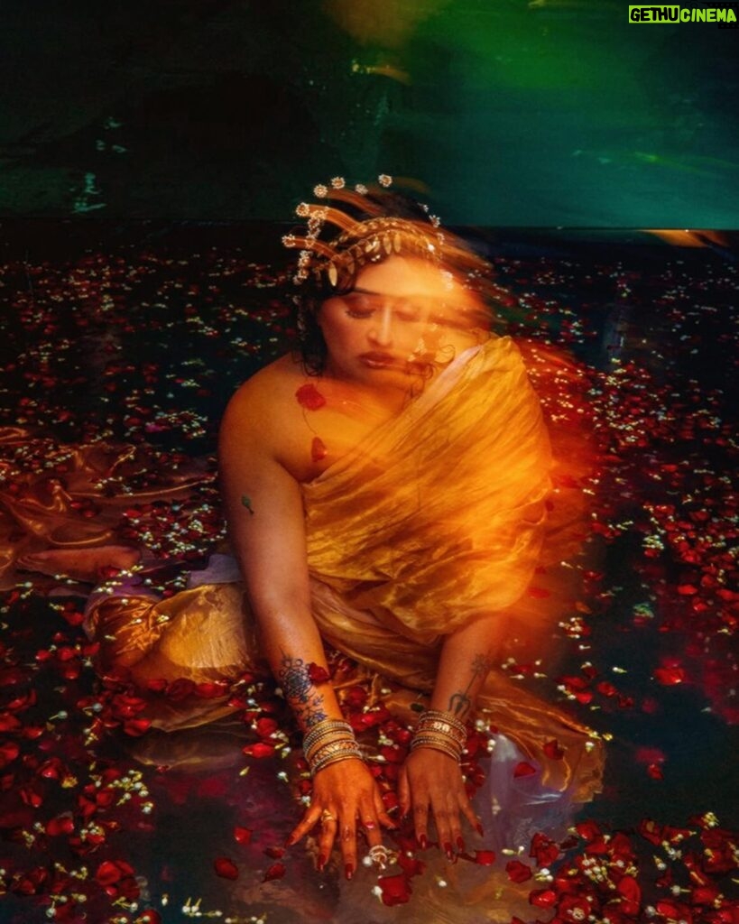 Raja Kumari Instagram - Gold … Water…. Flowers …. & the RAJAKUMARI …. Shoot diary … Styled by the super maddest and crazy @tryagaintoobad . . . . #colours #water #photoshoot #love #camera #music #artist #instagood #paintings #therajakumari #tejasnerurkarr