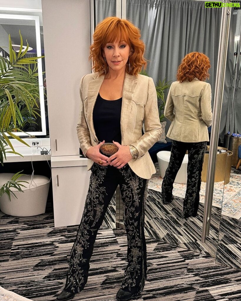 Reba McEntire Instagram - @Reba took the stage to perform the “Star-Spangled Banner” at Super Bowl LVIII in a @ralphlauren platinum lamé Western-inspired blazer embellished with more than 175,800 transparent Swarovski crystals. “This ain’t my first rodeo!” McEntire said ahead of the performance. “I’d never have imagined when I sang the anthem at the National Finals Rodeo 50 years ago that I’d be singing it today at the Super Bowl. I’m so honored to be part of this.” Get a behind-the-scenes look at how @reba prepared for the show at the link in bio. Report: @knowandtell