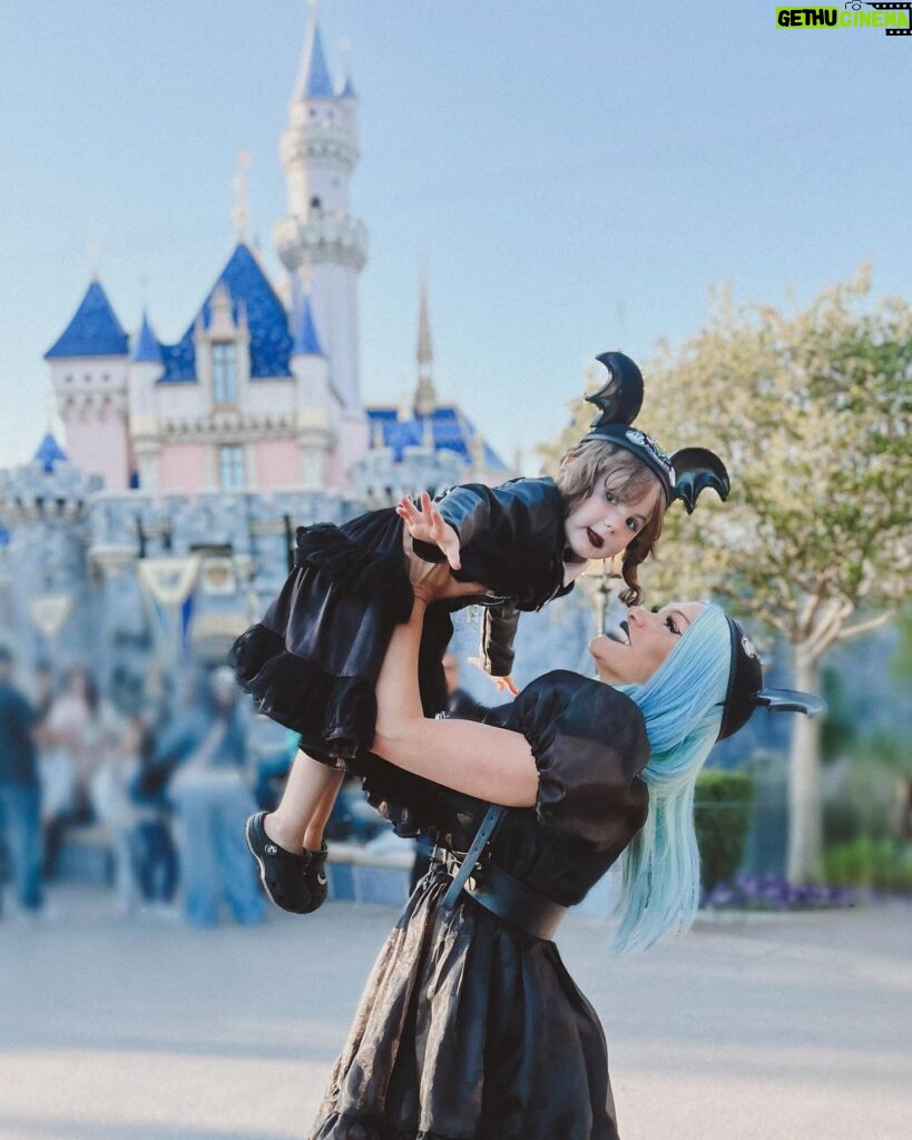 Rebecca Victoria Hardy Instagram - Dark paradise 🖤🦇🕸️ Ears: @batsday Jacket: @blackcraftcult #disneyland #gothicbaby #batsday #alt #goth #mommyandme