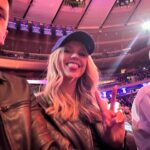 Riley Voelkel Instagram - Go Knicks 🏀 @nyknicks @thegarden #nyknicks #letsgo #ootd Jackets& Boots @allsaints Top and Pants @lagencefashion Ring @ettika Earrings @pebbyforevee Styled by @718blonde